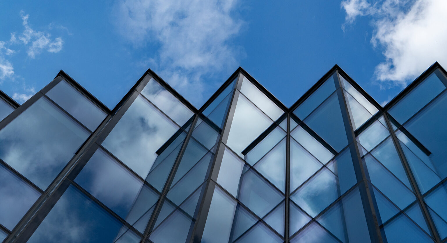 Clear windows with a blue sky behind
