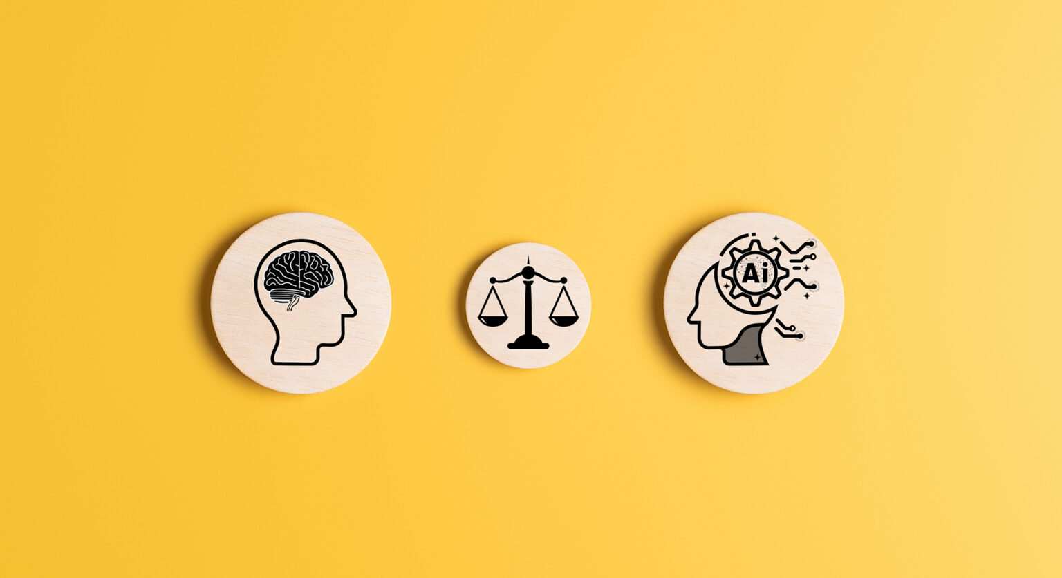 a little drawing of a human head showing the brain facing a drawing of a head with an AI logo inside it. In the centre is legal scales.