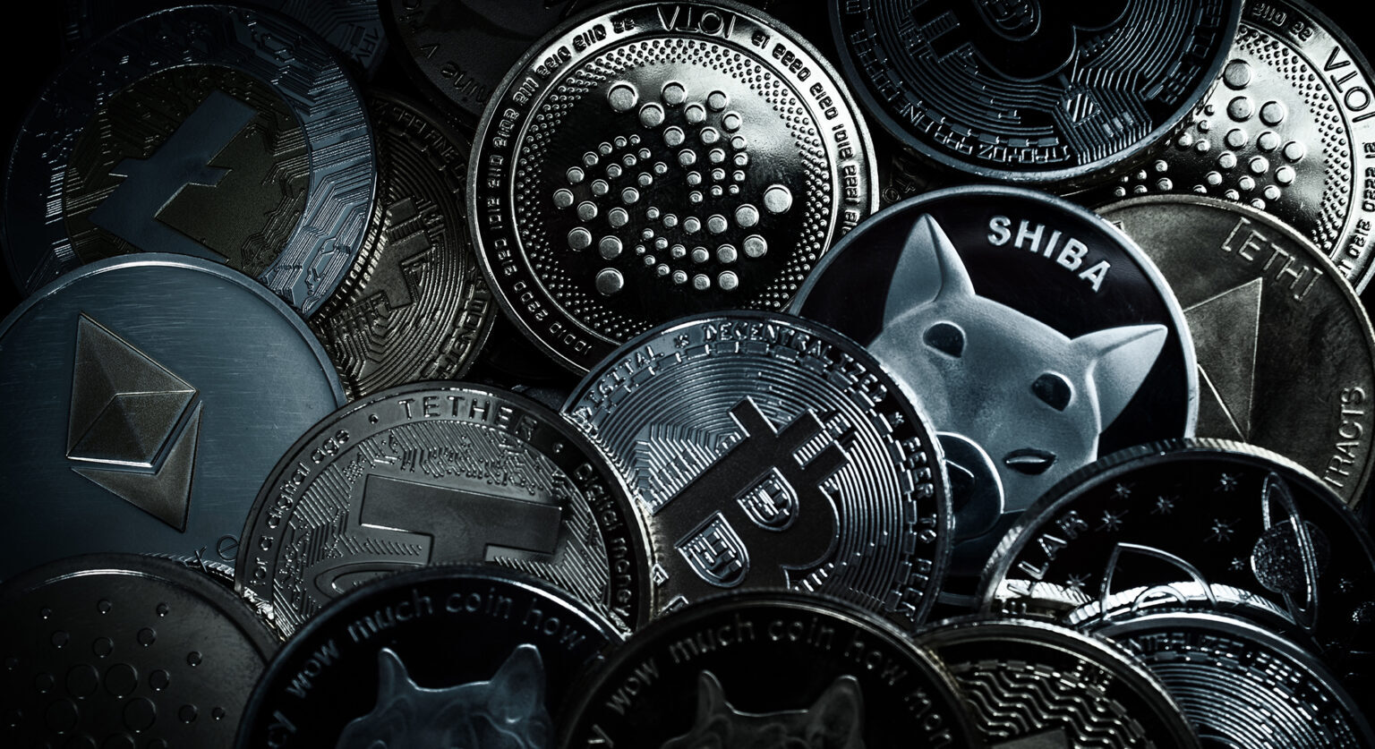 A pile of crypto currency icon set into coins