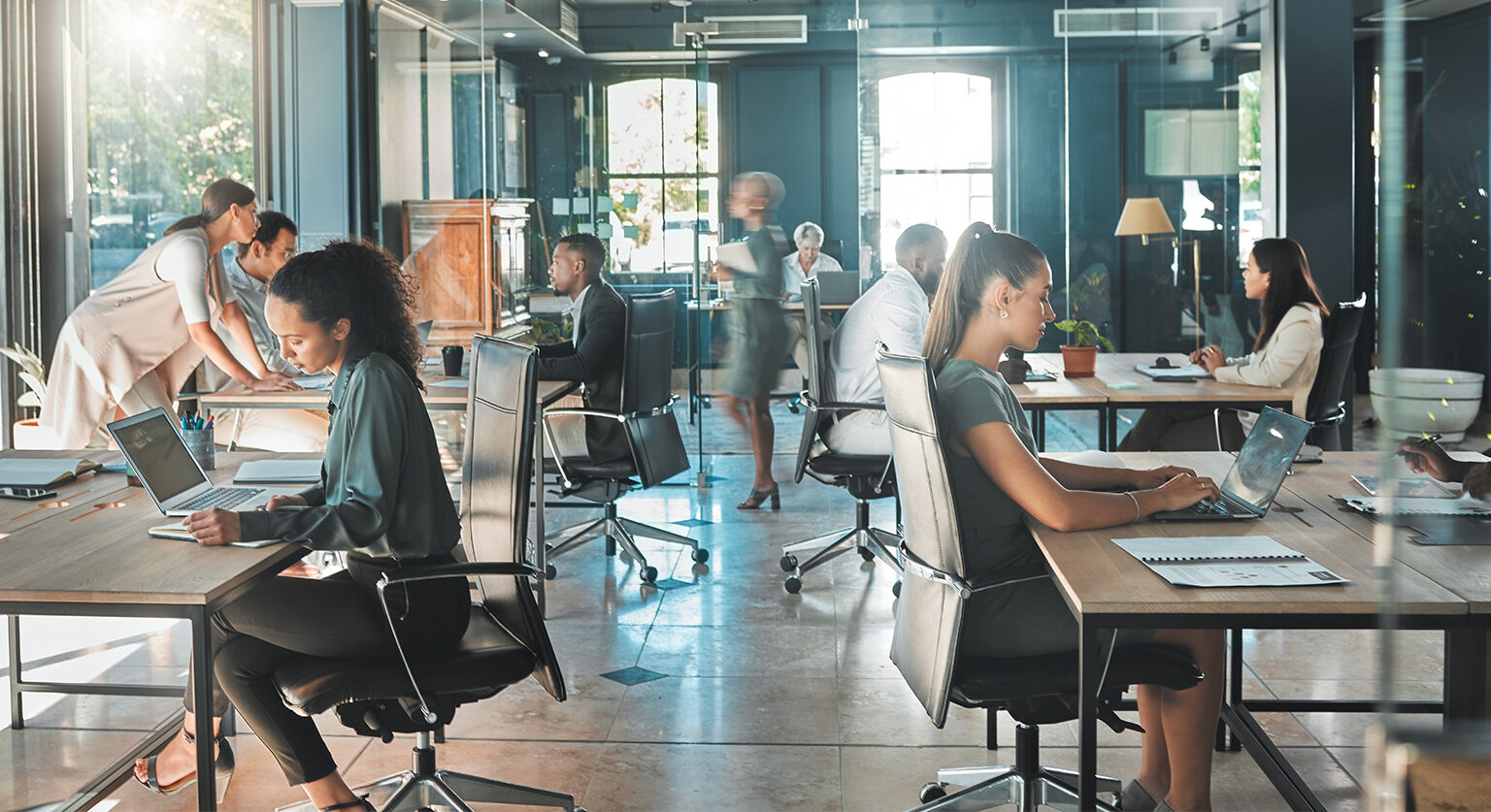 People working in a busy office